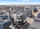 This is an aerial view of a townhome community and the surrounding areas at 6792 Navajo Way, Denver, CO 80221