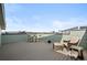 This rooftop deck has stylish outdoor furniture and lots of room to relax at 6792 Navajo Way, Denver, CO 80221