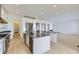 Spacious kitchen featuring stainless steel appliances, stylish countertops, and an open layout for entertaining at 3877 Treadway Pt, Castle Rock, CO 80108