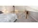 Bedroom loft featuring neutral carpeting, and stairs leading to another area at 6033 Trailhead Rd, Highlands Ranch, CO 80130