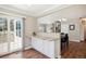Inviting dining area with sliding glass doors, flowing into the main floor and a staircase to upper level at 6033 Trailhead Rd, Highlands Ranch, CO 80130