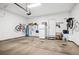 Spacious two-car garage featuring ample storage and access to backyard at 6033 Trailhead Rd, Highlands Ranch, CO 80130