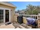 Outdoor patio with slider to kitchen with views of the well maintained neighborhood at 6033 Trailhead Rd, Highlands Ranch, CO 80130