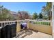 Outdoor patio perfect for barbecues with railings overlooking landscaped yard at 6033 Trailhead Rd, Highlands Ranch, CO 80130