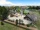 Majestic aerial shot of the estate, highlighting the beautifully landscaped grounds, multiple garages, and long private driveway at 50 Meade Ln, Cherry Hills Village, CO 80113