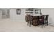 Basement featuring a wet bar with barstool seating at 50 Meade Ln, Cherry Hills Village, CO 80113