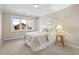 Cozy bedroom with a comfortable bed and ample natural light from the window at 50 Meade Ln, Cherry Hills Village, CO 80113