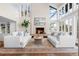 Bright living room with high ceilings, lots of natural light, and a fireplace at 50 Meade Ln, Cherry Hills Village, CO 80113