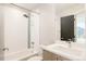 Simple bathroom with a bathtub and single vanity at 1822 Grove St # 110, Denver, CO 80204