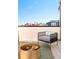 Rooftop deck with fire pit and city views at 1822 Grove St # 110, Denver, CO 80204