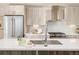 Modern kitchen with stainless steel appliances and white cabinetry at 1822 Grove St # 110, Denver, CO 80204