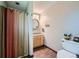 Functional bathroom with a shower, stylish vanity, and ample storage, offering convenience and comfort at 305 Cottonwood Ct, Longmont, CO 80501