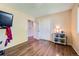 This bedroom has hardwood floors, a closet and a storage unit at 305 Cottonwood Ct, Longmont, CO 80501