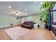 Bright living room showcasing a cozy seating area, ample natural light, and an open layout for versatile living at 305 Cottonwood Ct, Longmont, CO 80501