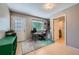 Functional home office space featuring a bright window, desk, and organized storage, ideal for remote work at 305 Cottonwood Ct, Longmont, CO 80501
