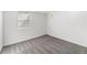 Bedroom with carpet flooring, white walls, a window, and ample space at 1858 S Lincoln St, Denver, CO 80210