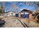 Backyard showing detached garage and parking pad at 1858 S Lincoln St, Denver, CO 80210