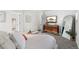 Spacious bedroom with stylish furniture, modern decor, and a tranquil, restful ambiance at 1858 S Lincoln St, Denver, CO 80210