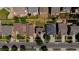 Overhead view of property highlighting the home's landscaping, driveway, and proximity to neighboring houses at 16643 E 101St Ave, Commerce City, CO 80022