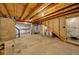 Unfinished basement with exposed beams and plenty of open space, ready for customization at 16643 E 101St Ave, Commerce City, CO 80022