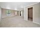 Generously sized bedroom with neutral carpet, walk-in closet, and large windows for ample sunlight at 16643 E 101St Ave, Commerce City, CO 80022