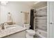 Bathroom features a shower and tub combo and granite counters at 795 S Alton Way # 4C, Denver, CO 80247