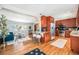 Open-concept living space with a modern kitchen, comfortable seating, and abundant natural light at 3582 Wright St, Wheat Ridge, CO 80033