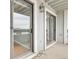 A balcony with sliding glass doors overlooks the neighborhood from this condo at 14214 E 1St Dr # B08, Aurora, CO 80011