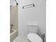 Classic bathroom with a tiled tub, shower, and toilet, providing a clean and functional space at 14214 E 1St Dr # B08, Aurora, CO 80011