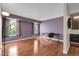 Bedroom with hardwood floors, natural light from the windows, and a work desk at 14214 E 1St Dr # B08, Aurora, CO 80011