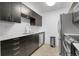 This kitchen features stainless steel appliances and modern cabinetry at 14214 E 1St Dr # B08, Aurora, CO 80011