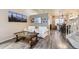 Inviting living room with wood floors, comfortable seating, and stylish decor at 3268 E 136Th Pl, Thornton, CO 80602