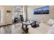 Bright and airy living space featuring a large arched window and modern decor at 3268 E 136Th Pl, Thornton, CO 80602
