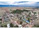 Aerial view showcases the neighborhood and proximity to Louviers Village Club at 7794 Louviers Blvd, Louviers, CO 80131