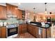Well-appointed kitchen with stainless steel appliances and granite countertops at 7794 Louviers Blvd, Louviers, CO 80131