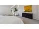 Comfortable bedroom with an accent cabinet, artwork, and lots of natural light at 2504 S Garfield St, Denver, CO 80210