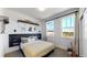 Spacious bedroom with large windows and stylish decor at 2980 E 102Nd Pl, Thornton, CO 80229