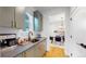 Modern kitchen features sleek cabinetry, quartz countertops, and high-end appliances at 2980 E 102Nd Pl, Thornton, CO 80229