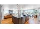 Spacious kitchen island with seating, perfect for casual dining and entertaining at 2980 E 102Nd Pl, Thornton, CO 80229