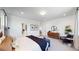Comfortable main bedroom with ensuite bathroom and sitting area at 2980 E 102Nd Pl, Thornton, CO 80229