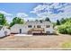 The house features a new deck and patio, and a yard awaiting personalization and landscaping at 6842 Garland St, Arvada, CO 80004