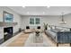 Bright and stylish living room featuring modern furniture and elegant decor throughout at 6842 Garland St, Arvada, CO 80004