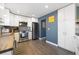 Modern kitchen with stainless steel appliances and ample cabinet space at 2540 E Geddes Pl, Centennial, CO 80122