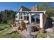 Relaxing back deck featuring stone fireplace and comfortable seating at 100 Wildcat Ln, Boulder, CO 80304
