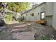 Backyard with stone steps and patio area, ideal for outdoor relaxation and entertaining at 100 Wildcat Ln, Boulder, CO 80304