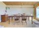 Dining area featuring a wooden table, chairs, and natural light, perfect for gatherings at 100 Wildcat Ln, Boulder, CO 80304