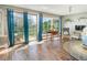 Bright living room with hardwood floors, large windows, and stylish décor for a comfortable living space at 100 Wildcat Ln, Boulder, CO 80304
