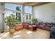 Spacious living room with large windows showcasing natural views and comfortable, stylish furnishings at 100 Wildcat Ln, Boulder, CO 80304