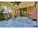 The backyard has a patio that leads up to French doors, featuring steps and a railing at 1109 Jersey St, Denver, CO 80220