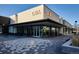 Commercial building exterior with expansive windows and outdoor seating at 1109 Jersey St, Denver, CO 80220